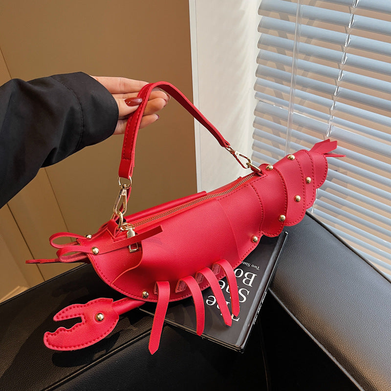 Lobster shape studded crossbody bag