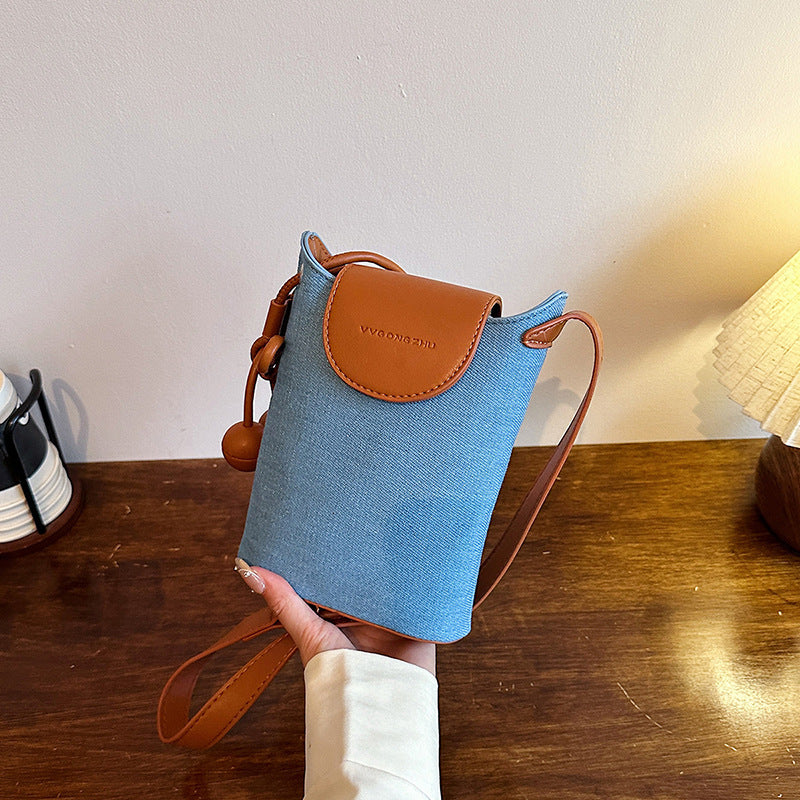 Mini woven phone crossbody bag