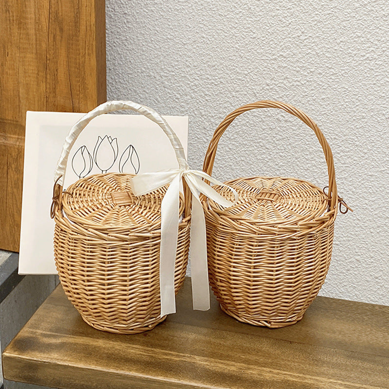 Rattan, wicker, and bamboo hand-woven French basket bag