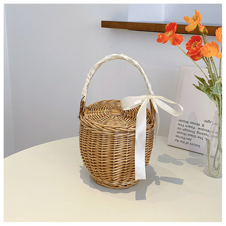 Rattan, wicker, and bamboo hand-woven French basket bag