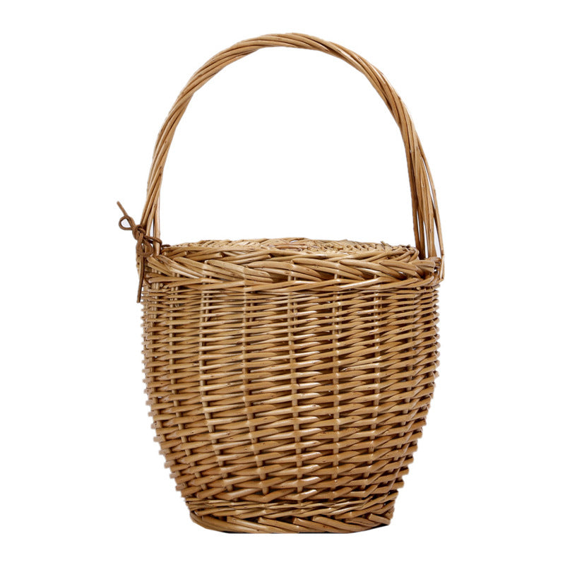 Rattan, wicker, and bamboo hand-woven French basket bag
