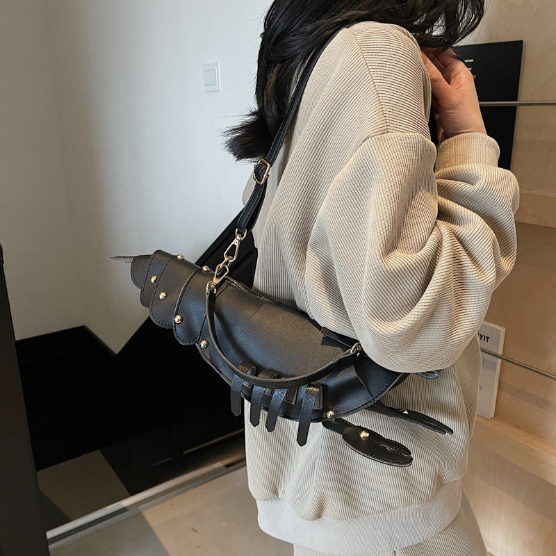 Lobster shape studded crossbody bag